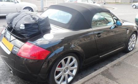 black audi tt roadster with a boot-bag vacation boot rack fitted