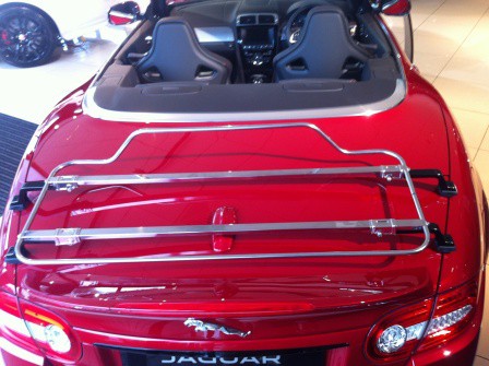 aerial view of a burgundy jaguar xk convertible with a stainless steel boot rack fitted