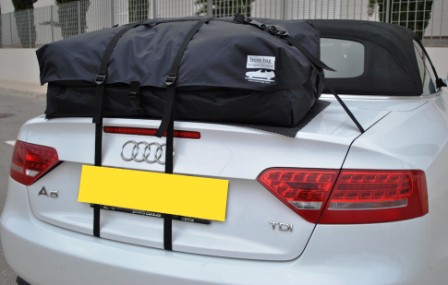 white audi a5 convertible with a boot-bag vacation boot rack fitted