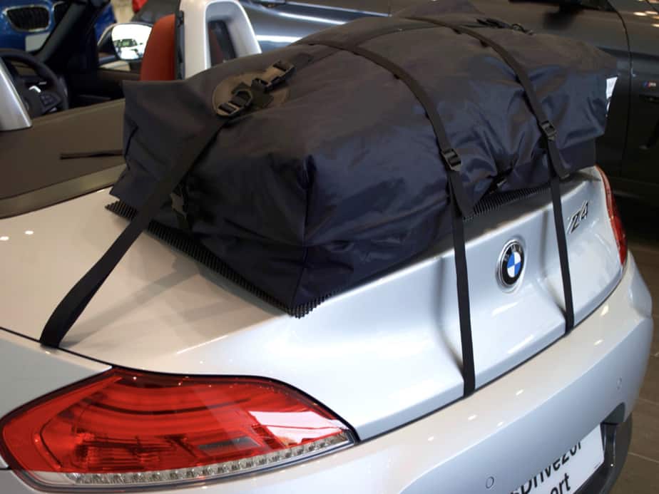 silver bmw z4 e89 with the hood down in a bmw showroom and a bootbag vacation boot rack fitted