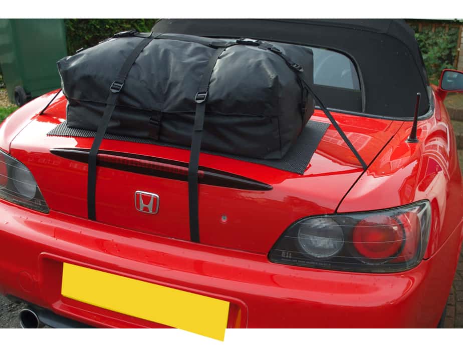 red honda s2000 with a boot-bag original luggage rack fitted to the boot