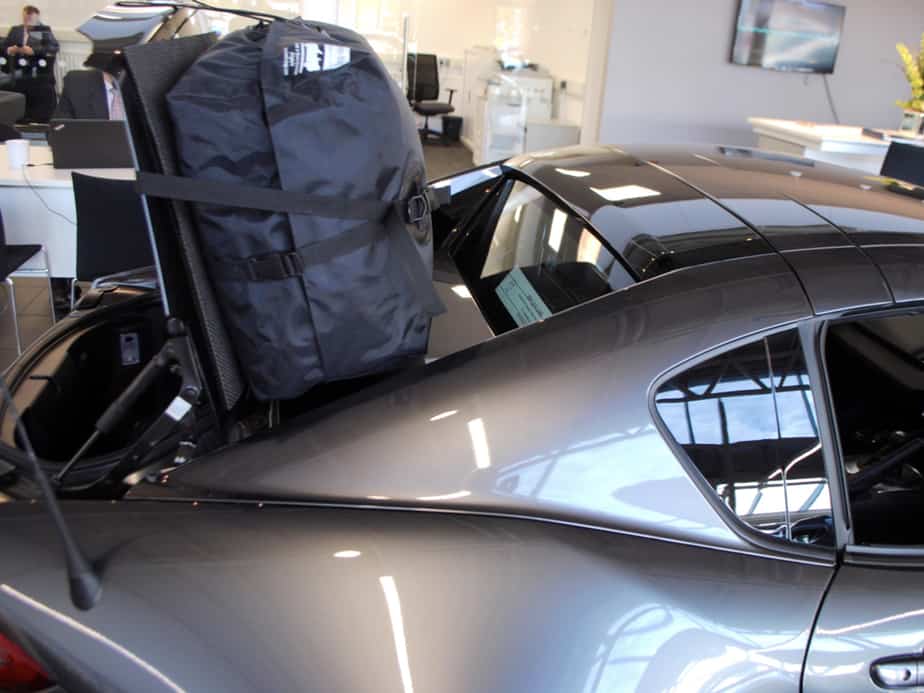 mx5 rf with a the boot open showing the strapping system on the boot-bag boot rack