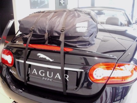 rear view of a jaguar xk convertible with a boot-bag original boot rack fitted