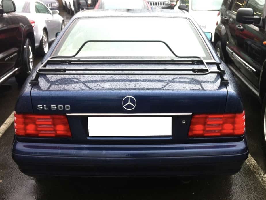 blue mercdes sl 500 r129 with a black boot rack fitted