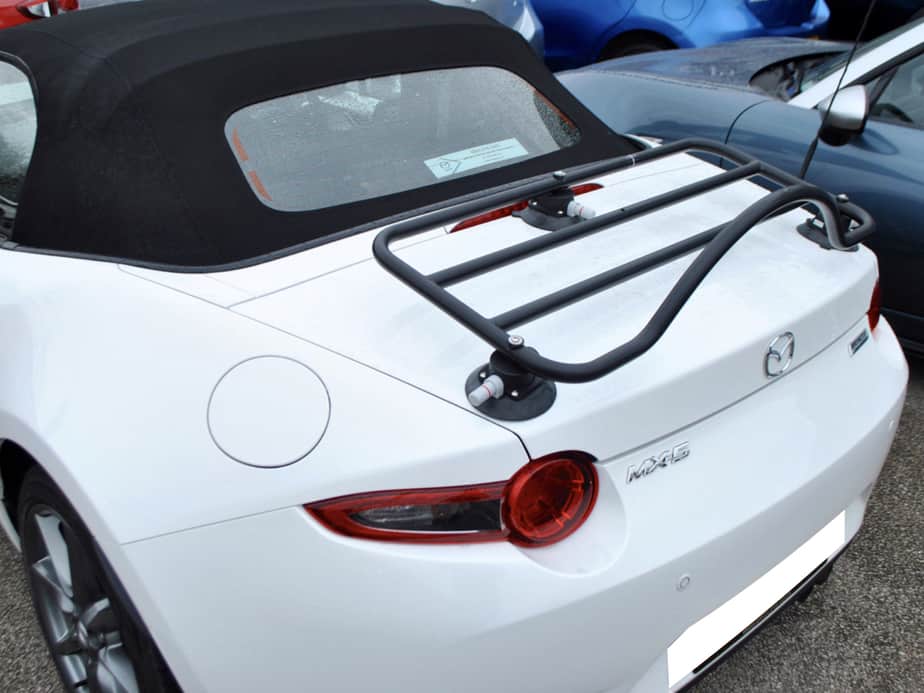 white mx5 mk4 with a boot rack fitted