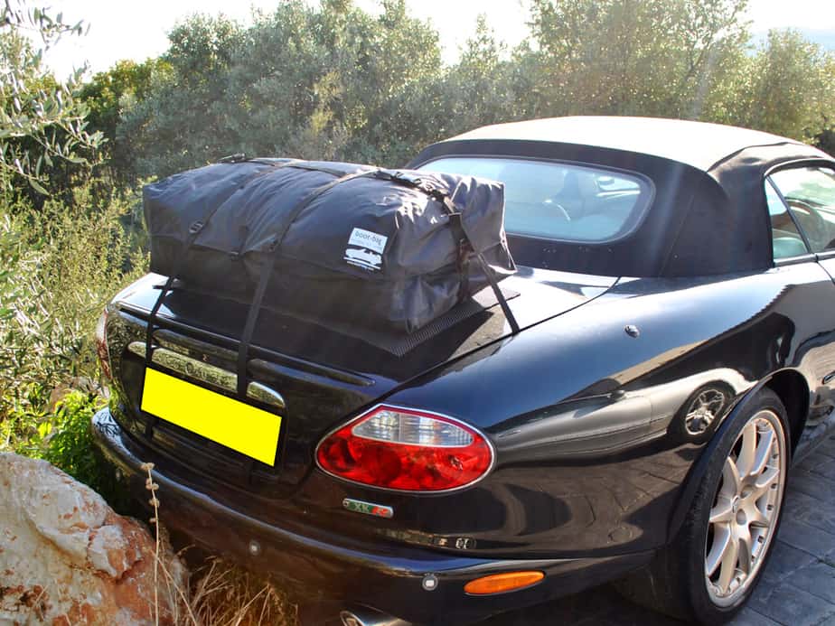 black jaguar xk8 convertible with a boot-bag vacation boot rack fitted