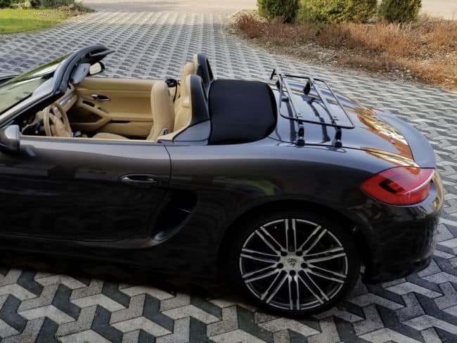 side view of a 981 porsche boxster with a black luggage rack fitted