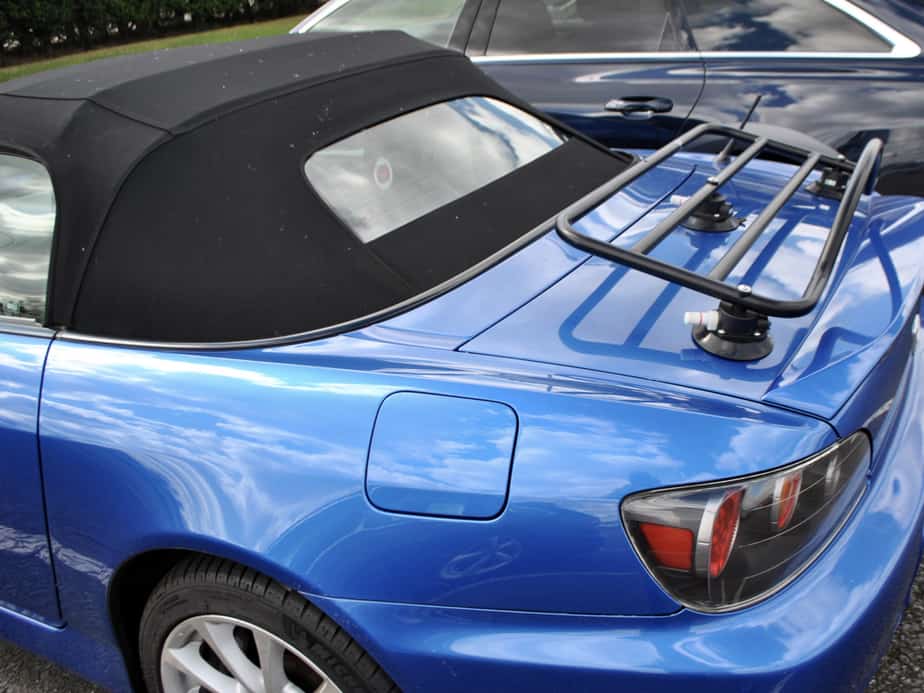 blue honda s2000 with a blakc revo-rack luggage rack fitted