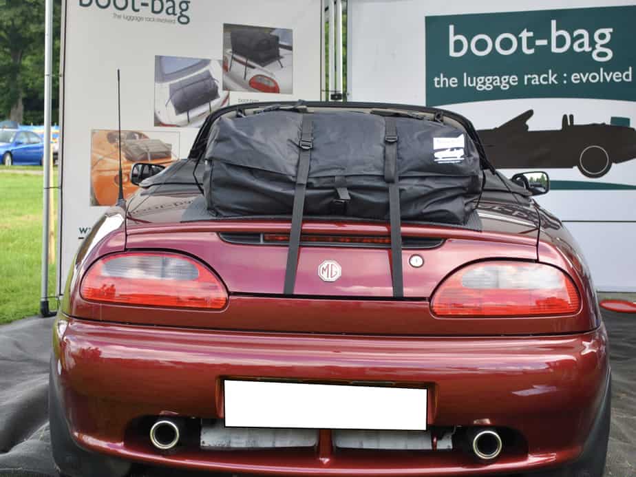 burgundy mgf with a boot-bag original boot rack fitted on an exhibition stand