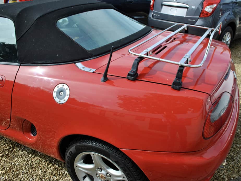 side view of an MGF with a stainless steel boot rack fitted