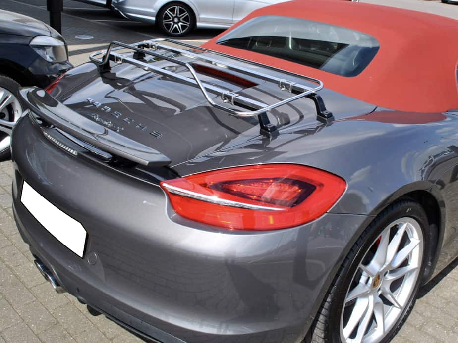 silver porsche boxster 981 with a red hood and a stainless steel boot rack fitted